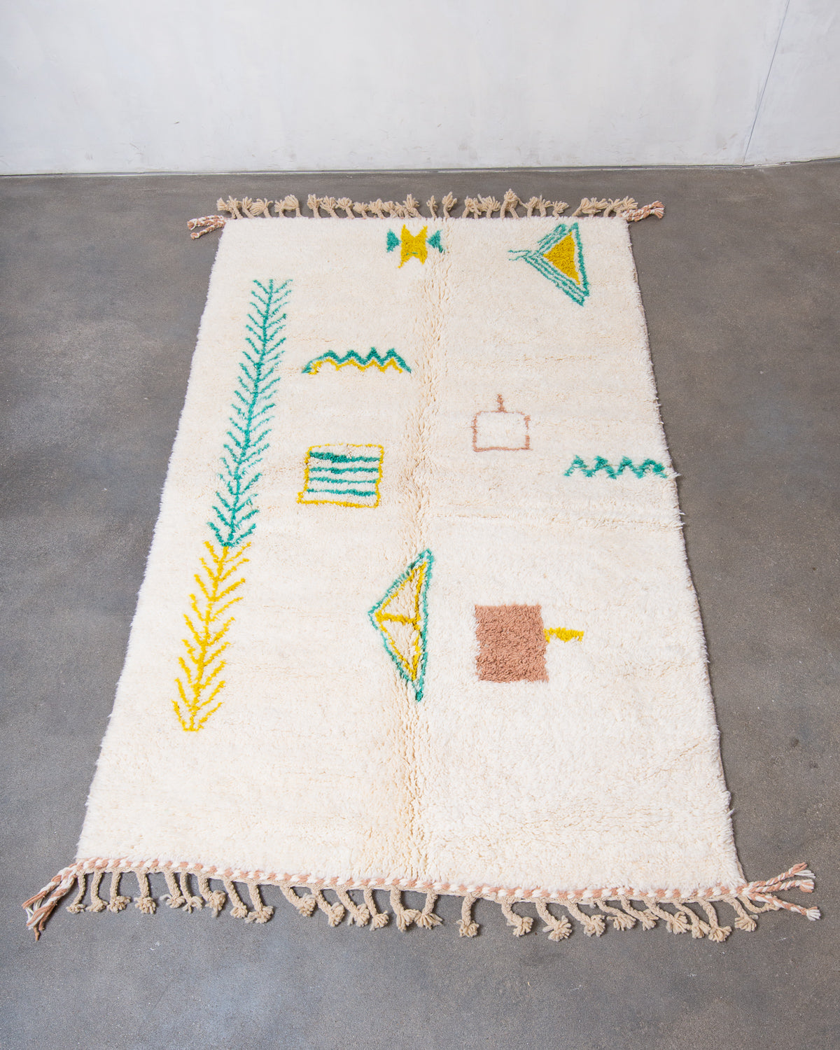 Modern, designer, handcrafted Berber rug from Morocco. Beniourain carpet with beautiful colours and patterns and fluffy wool texture.